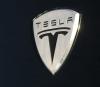 Operar en Tesla en binarias